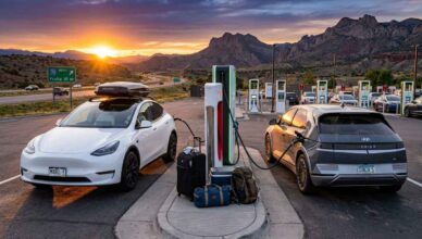 photorealistic image of a Tesla Model Y Long Range and Hyundai Ioniq 5 parked at a highway DC fast charging station in the United States at sunset