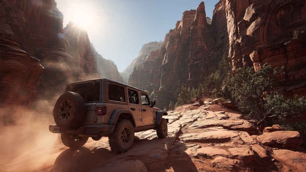 2026 Jeep Wrangler Rubicon on a red rock trail in the American Southwest, doors removed